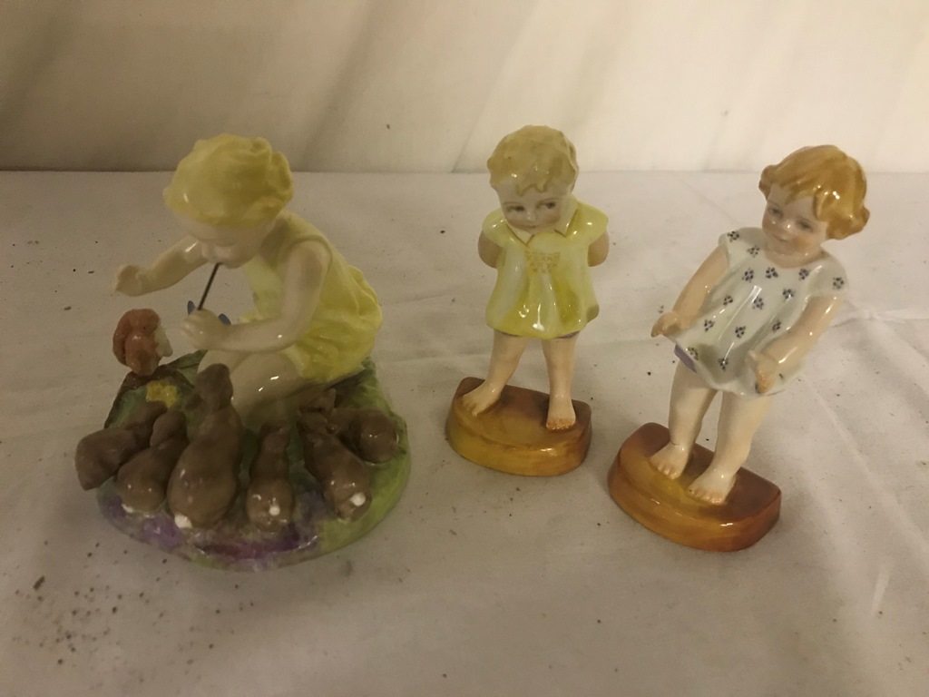 Three Royal Worcester child figures by Doughty