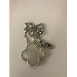 An 18 ct Van Cleef & Arpels quatrefoil Mother of pearl pendant with bead border and Van Cleef &