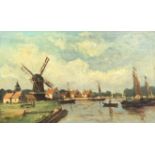 Johanne Karel Leurs (Dutch, 1865-1938): Canal scene with windmill & houses, oil on canvas,