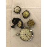 Four silver trench watches;