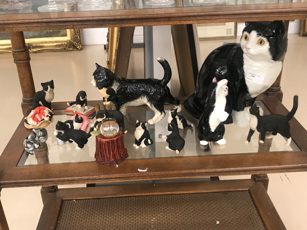 A quantity of cat figures