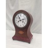 A mahogany balloon case Edwardian clock