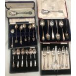 A quantity of cased spoons to inc silver examples