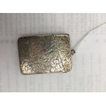 A silver vesta case