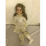 A vintage German doll (head size 9)
