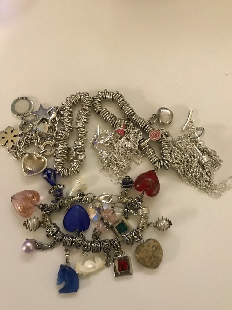 A quantity of dress charm bracelets