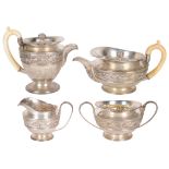 A Four-Piece late Victorian/Edwardian Silver and Ivory Handled Tea/Coffee Service: Of "cape"