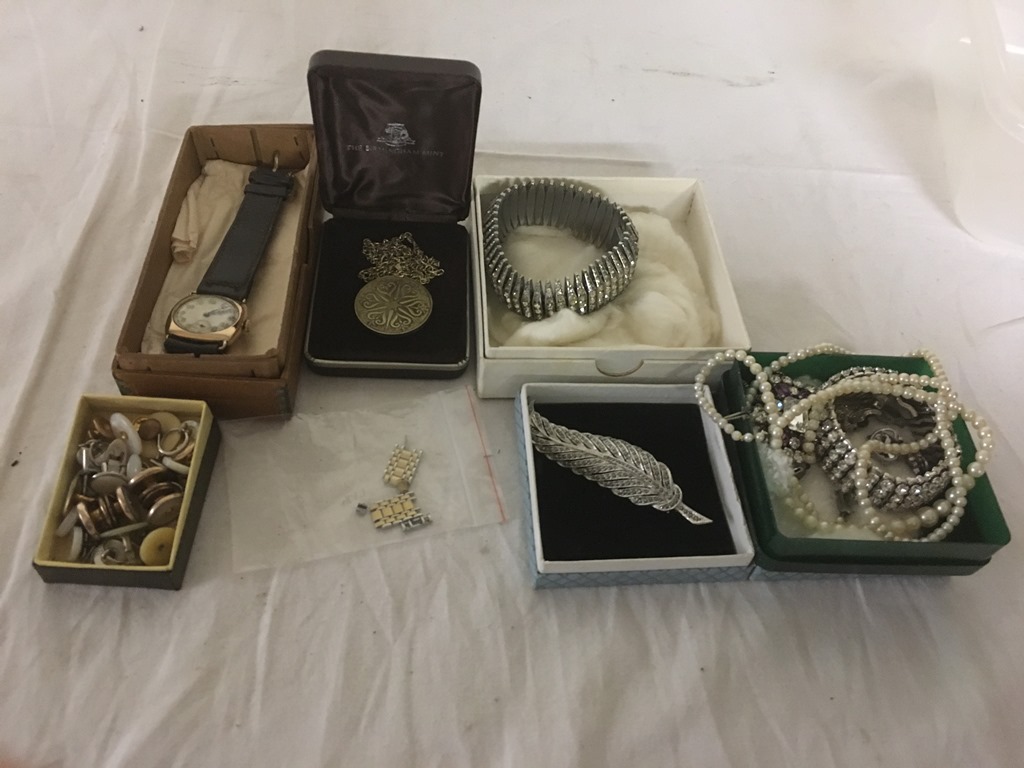 A box of vintage dress jewellery to inc a gold watch etc