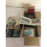 A quantity of postcards and ephemera