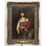 An oleograph of a young woman with flowers after Alexei Harlamoff, in good quality frame,