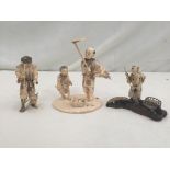 Three Meiji period ivory okimonos of farm workers and peasants