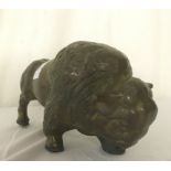 A bronze figure of a buffalo,