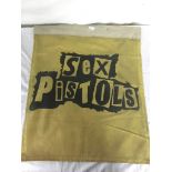 A large Sex Pistols punk rock concert banner