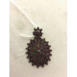 A vintage garnet pendant