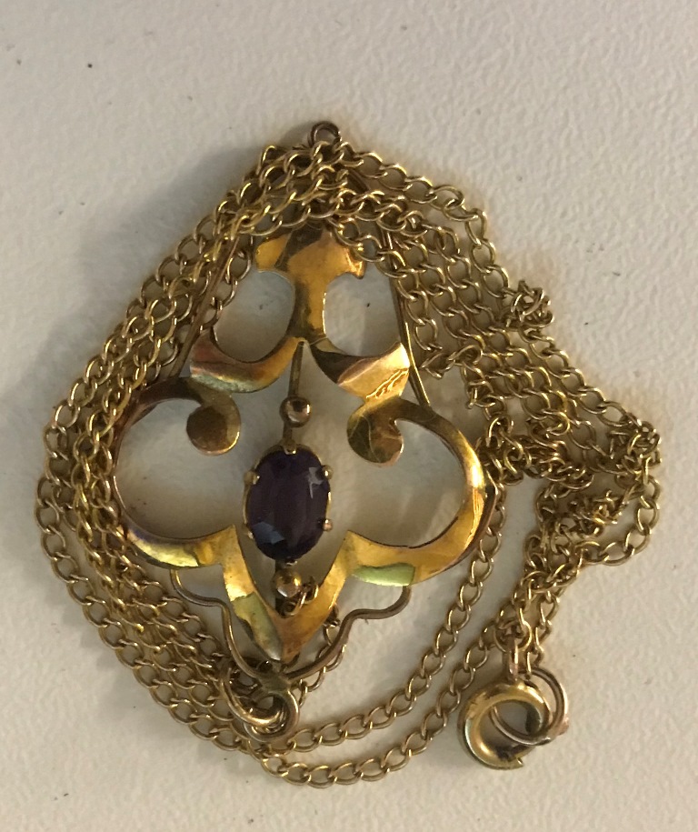 An Edwardian amethyst pendant on chain