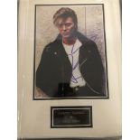 A framed and glazed signed photograph of David Bowie (with COA)