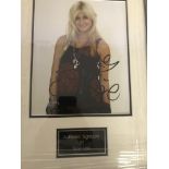 A framed and glazed signed photograph of Pixie Lott (with COA)