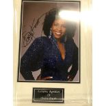 A framed and glazed signed photograph of Gladys Knight (with COA)