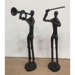 A pair of cast metal figures to inc a conductor & trumpeter in modern style,