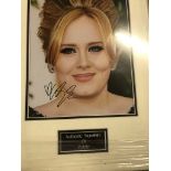 A framed and glazed signed photograph of Adele (with COA)