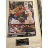 A framed and glazed Sir Henry Cooper montage (with COA)