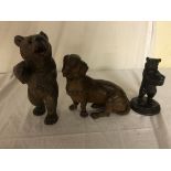 Three Black Forest carved wooden animals