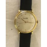 A 1950's 18K 1WC gentleman's wristwatch, dial set with Arabic even numerals,