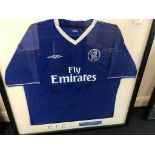 A multi-signed framed Chelsea shirt,