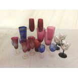 A collection of coloured drinking glasses