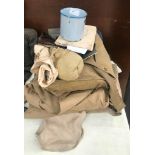 A WWII RAF kit bag containing a uniform, paperwork, glass,