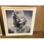 A framed picture of Marilyn Monroe