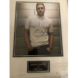 A framed and glazed signed photograph of Olly Muirs (with COA)