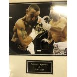 A framed and glazed signed photograph of Amir Khan (with COA)