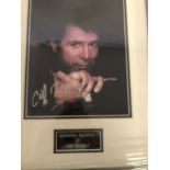 A framed and glazed signed photograph of Cliff Richard (with COA)