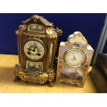 A 19th century French mantel clock striking on bell;