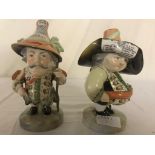 A pair of Crown Derby Mansion dwarf figures - orange marks to base,