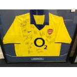 A multi-signed framed Arsenal shirt, 2003-2004 season signatures inc Martin Keown, Jens Lehmann,