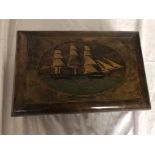 A 19th century walnut sewing box inlaid with a ship