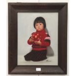 An oil on canvas of an Oriental child, indistinctly signed lower right,