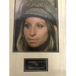 A framed and glazed signed photograph of Barbra Streisand (with COA)