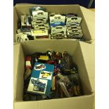 Two boxes of diecast vehicles