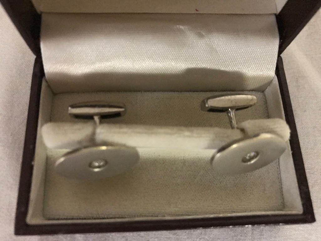 A 9ct diamond set cufflinks