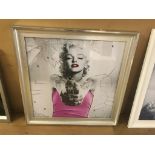 A framed picture of Marilyn Monroe