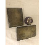 Two HM silver cigarette cases;