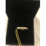 A 9ct gold three-diamond ring