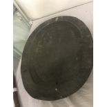 An 18th century pewter platter