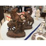 A pair of spelter horses with men