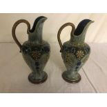 A pair of Royal Doulton stoneware jugs