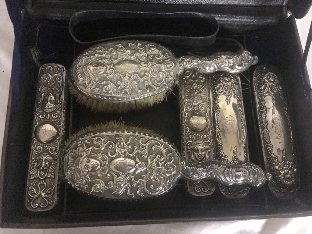 A cased HM silver brush set