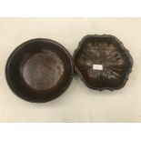 A pair of heavy cast bronze fruit bowls/dishes